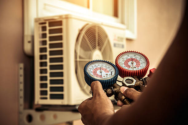 Professional Hvac technician working in Madison, IL